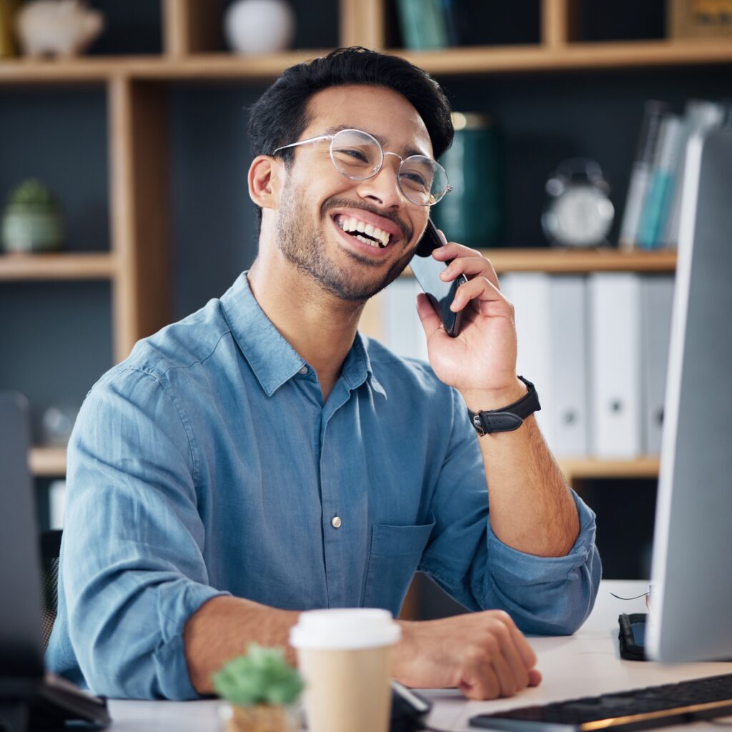 Business man, phone call and laughing at computer, office desk or conversation with smile. Happy wo