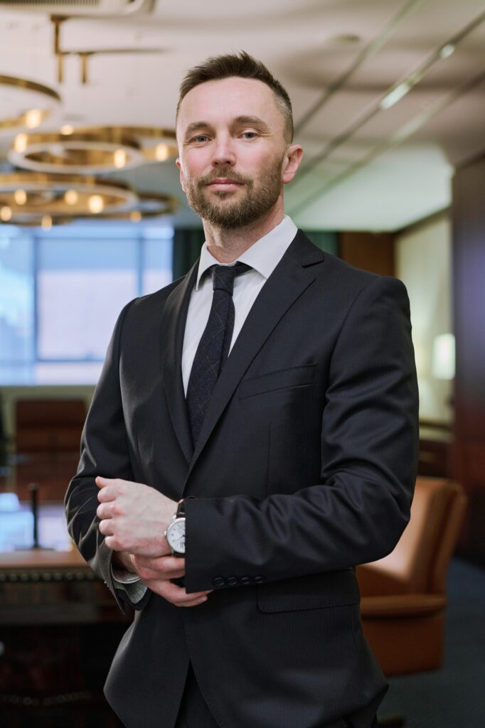 Young confident owner of small business